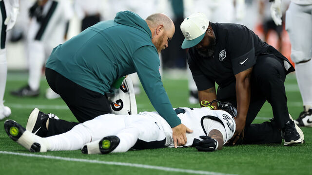 FOXBOROUGH, MASSACHUSETTS - AUGUST 22: Ja'Quinden Jackson #45 of the Philadelphia Eagles suffers a head injury during the first quarter of a preseason game against the New England Patriots at Gillette Stadium on August 22, 2026 in Foxborough, Massachusetts.