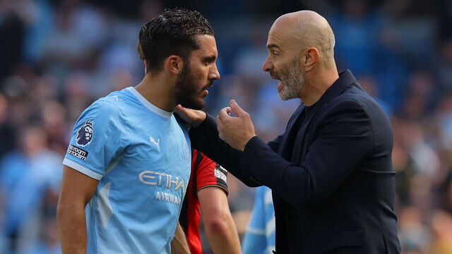 MANCHESTER, ENGLAND - AUGUST 23: Manchester City Manager Enzo Maresca speaks with Rayan Cherki at full time during the Premier League 2026/27 match between Manchester City and AFC Bournemouth at Etihad Stadium on August 23, 2026 in Manchester, England.