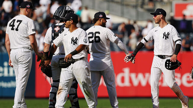 NEW YORK, NEW YORK - AUGUST 23: The New York Yankees celebrate after their win during the ninth inning against the Toronto Blue Jays at Yankee Stadium on August 23, 2026 in the Bronx borough of New York City. The Yankees won 8-3.