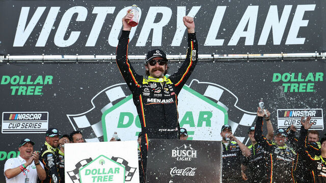 LOUDON, NEW HAMPSHIRE - AUGUST 23: Ryan Blaney, driver of the #12 Menards/Dutch Boy Ford, celebrates in victory lane after winning the NASCAR Cup Series Dollar Tree 301 at New Hampshire Motor Speedway on August 23, 2026 in Loudon, New Hampshire.