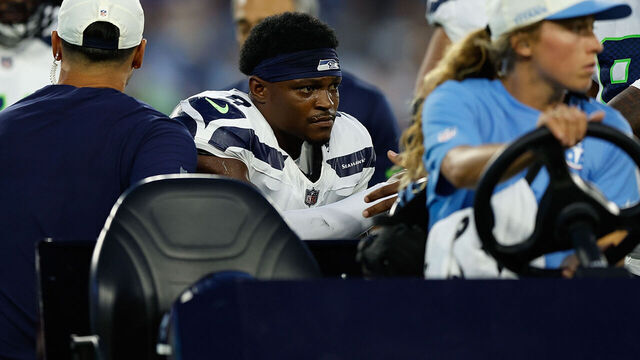 NASHVILLE, TENNESSEE - AUGUST 23: Bud Clark #9 of the Seattle Seahawks is carted off the field injured during the first half of a preseason game against the Tennessee Titans at Nissan Stadium on August 23, 2026 in Nashville, Tennessee.