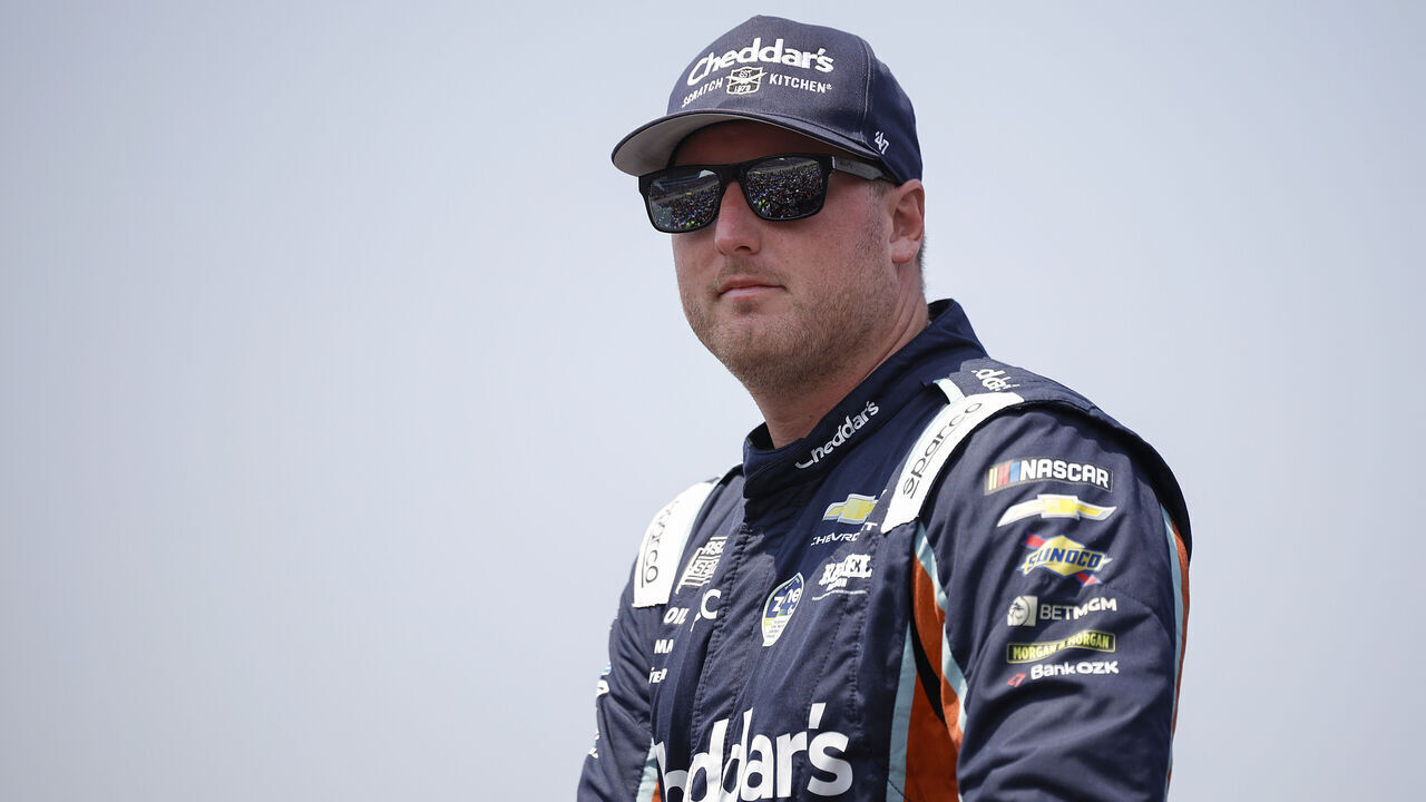 NEWTON, IOWA - AUGUST 09: Austin Hill, driver of the #33 Cheddar's Scratch Kitchen Chevrolet, walks onstage during driver intros prior to the NASCAR Cup Series Iowa Corn 350 Powered by Ethanol at Iowa Speedway on August 09, 2026 in Newton, Iowa.