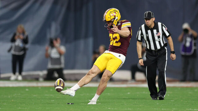 PHOENIX, ARIZONA - DECEMBER 26: Place kicker Brady Denaburg #92 of the Minnesota Golden Gophers kicks the ball off during the first half of the 2025 Rate Bowl against the New Mexico Lobos at Chase Field on December 26, 2025 in Phoenix, Arizona. The Golden Gophers defeated the Lobos 20-17 in overtime.
