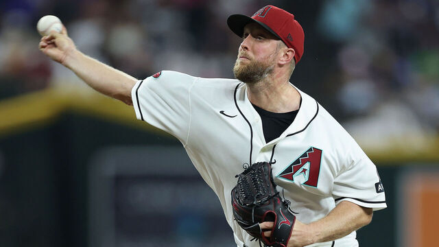 PHOENIX, ARIZONA - AUGUST 24: Starting pitcher Merrill Kelly #29 of the Arizona Diamondbacks pitches against the Chicago Cubs during the first inning of the MLB game at Chase Field on August 24, 2026 in Phoenix, Arizona.