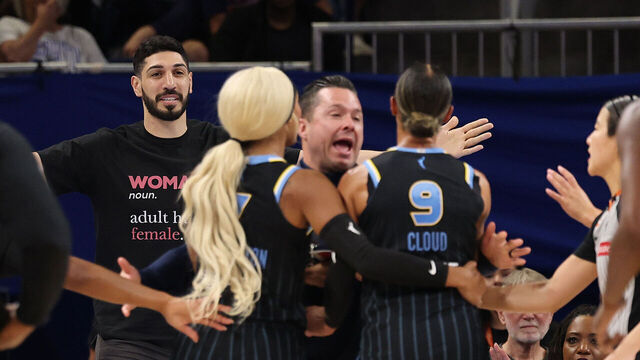 CHICAGO, ILLINOIS - AUGUST 23: Former basketball player Enes Kanter Freedom and Natasha Cloud #9 of the Chicago Sky yell at one another during the second half between the Chicago Sky and the Indiana Fever at Wintrust Arena on August 23, 2026 in Chicago, Illinois.