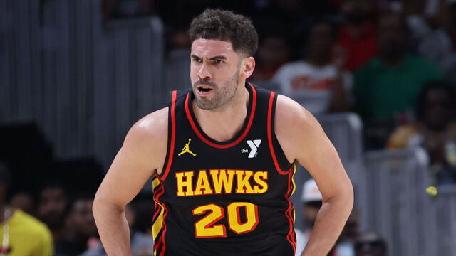 ATLANTA, GA - APRIL 18: Georges Niang #20 of the Atlanta Hawks celebrates during the game against the Miami Heat on April 18, 2025 at State Farm Arena in Atlanta, Georgia. NOTE TO USER: User expressly acknowledges and agrees that, by downloading and/or using this Photograph, user is consenting to the terms and conditions of the Getty Images License Agreement. Mandatory Copyright Notice: Copyright 2025 NBAE
