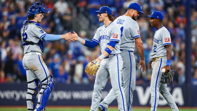 TORONTO, CANADA - AUGUST 25: Carter Jensen #22, Bobby Witt Jr. #7, Steven Cruz #64 and Tyler Tolbert #2 of the Kansas City Royals celebrate after their MLB game against the Toronto Blue Jays at Rogers Centre on August 25, 2026 in Toronto, Ontario, Canada.