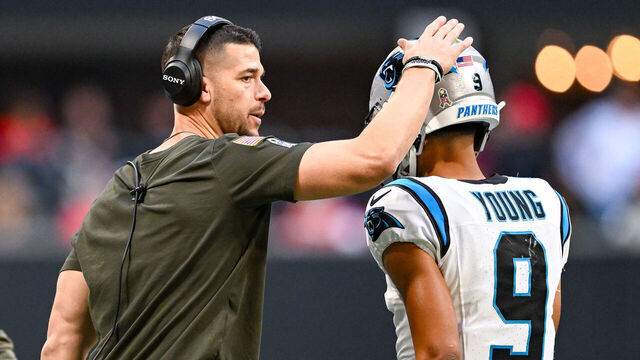 ATLANTA, GA - NOVEMBER 16: Carolina head coach Dave Canales encourages quarterback Bryce Young (9) during the NFL game between the Carolina Panthers and the Atlanta Falcons on November 16th, 2025 at Mercedes-Benz Stadium in Atlanta, GA.