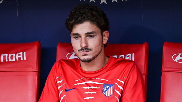 Julian Alvarez (No. 19) of Atletico Madrid warms up on the sideline during the LaLiga regular season Round 2 match against Villarreal at Civitas Metropolitano in Madrid, Spain, on August 23, 2026.