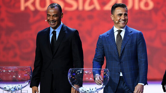 MOSCOW, RUSSIA - DECEMBER 01: Draw assistant, Cafu and draw assistant, Fabio Cannavaro share a laugh during the Final Draw for the 2018 FIFA World Cup Russia at the State Kremlin Palace on December 1, 2017 in Moscow, Russia.