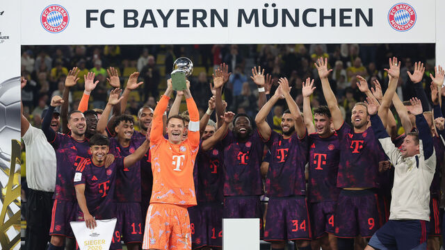 DORTMUND, GERMANY - AUGUST 22: Manuel Neuer team celebrating with the trophy AWARDS CEREMONY during the Franz Beckenbauer Supercup match between Borussia Dortmund and FC Bayern München at Signal Iduna Park on August 22, 2026 in Dortmund, Germany.