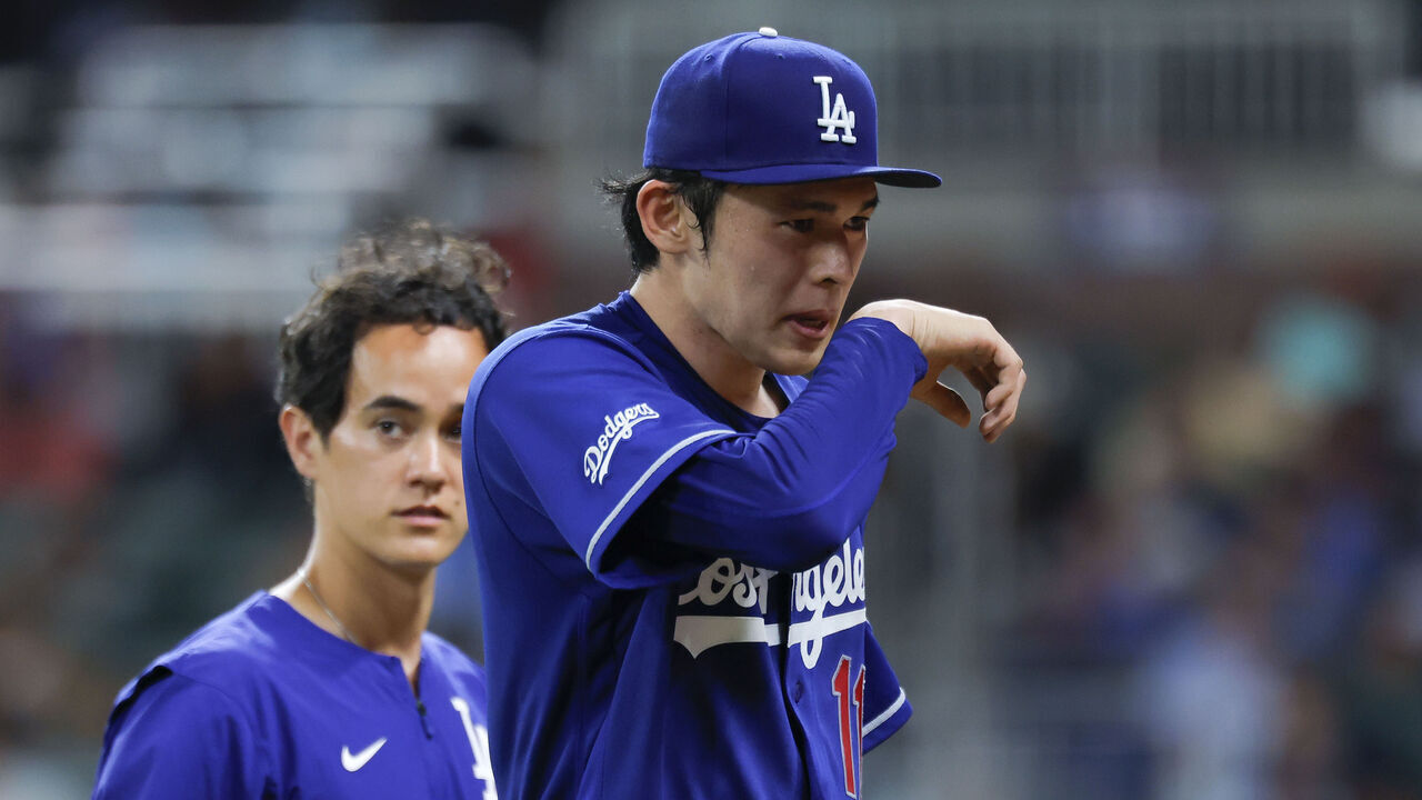 ATLANTA, GEORGIA - AUGUST 26: Roki Sasaki #11 of the Los Angeles Dodgers is pulled from the game due to an injury during the fourth inning against the Atlanta Braves at Truist Park on August 26, 2026 in Atlanta, Georgia.