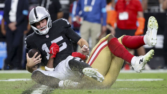 LAS VEGAS, NEVADA - AUGUST 27: Keion White #56 of the San Francisco 49ers sacks Fernando Mendoza #15 of the Las Vegas Raiders during the second quarter of a preseason game at Allegiant Stadium on August 27, 2026 in Las Vegas, Nevada.