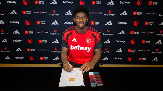 MANCHESTER, ENGLAND - AUGUST 25: (EXCLUSIVE COVERAGE) Carlos Baleba of Manchester United poses after signing for the club at Carrington Training Ground on August 25, 2026 in Manchester, England.