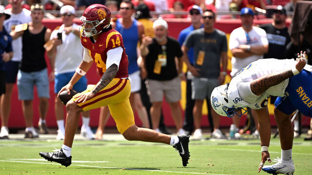 Los Angeles, - August 29: Quarterback Jayden Maiava #14 of the USC Trojans scrambles for yardage against the San José State Spartans in the first half of a NCAA football game at the Los Angeles Memorial Coliseum in Los Angeles on Saturday, August 29, 2026.