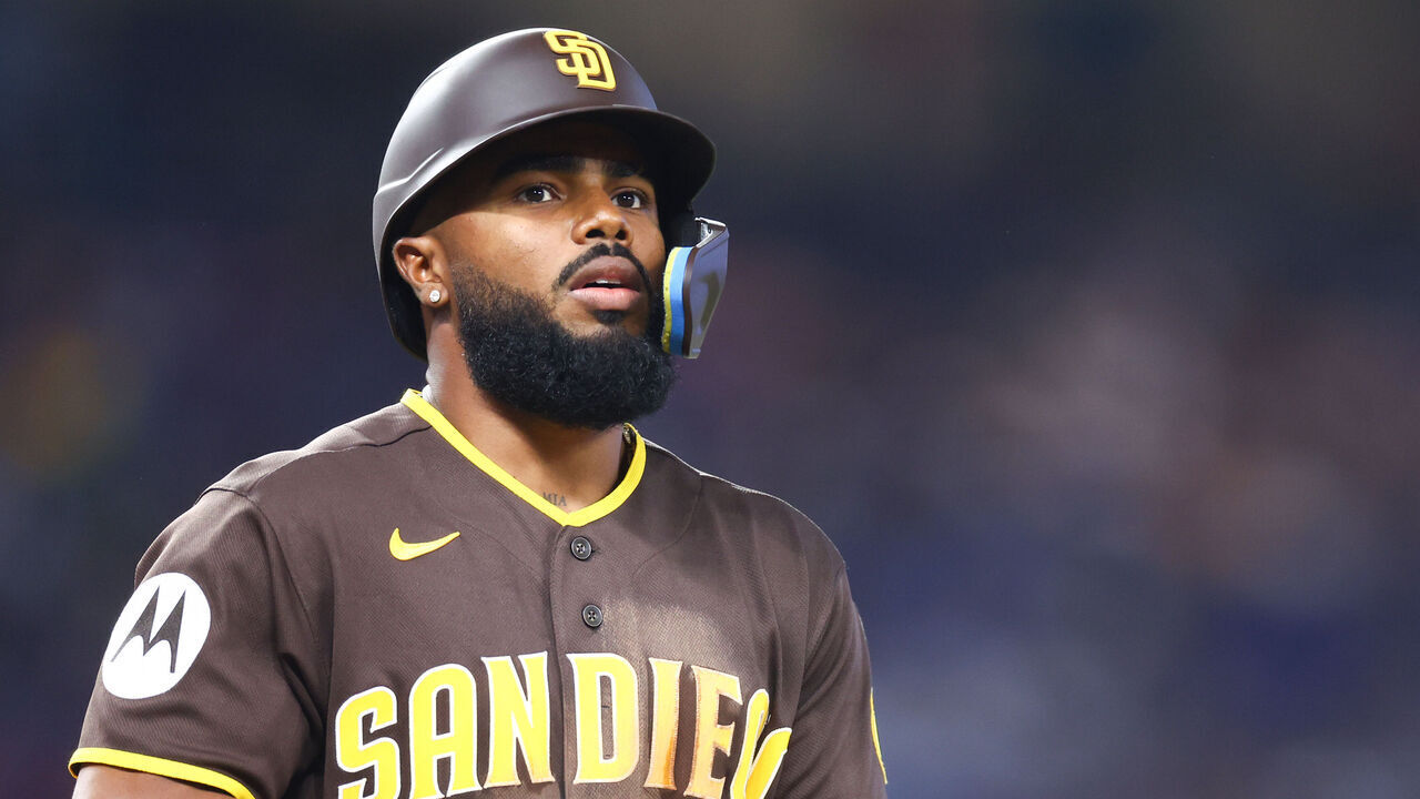 MIAMI, FLORIDA - JULY 25: Luis Rengifo #21 of the San Diego Padres runs to first base against the Miami Marlins in the eighth inning of the game at loanDepot park on July 25, 2026 in Miami, Florida.