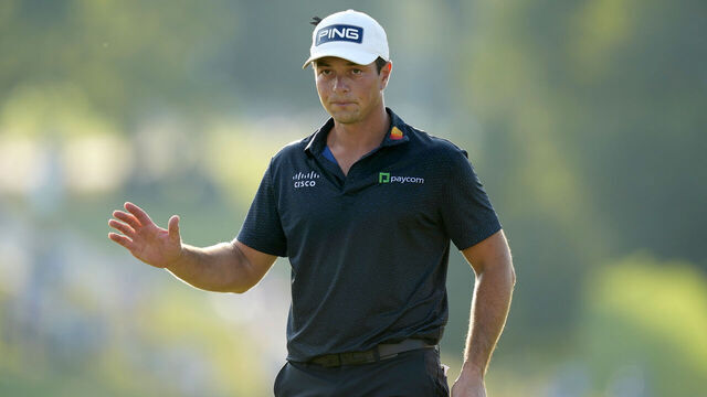 ATLANTA, GEORGIA - AUGUST 29: Viktor Hovland of Norway reacts on the 18th green during the third round of the TOUR Championship at East Lake Golf Club on August 29, 2026 in Atlanta, Georgia.
