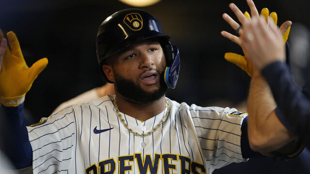 MILWAUKEE, WISCONSIN - AUGUST 29: Jackson Chourio #11 of the Milwaukee Brewers celebrates in the dugout after hitting a solo home run against the Texas Rangers in the first inning at American Family Field on August 29, 2026 in Milwaukee, Wisconsin.