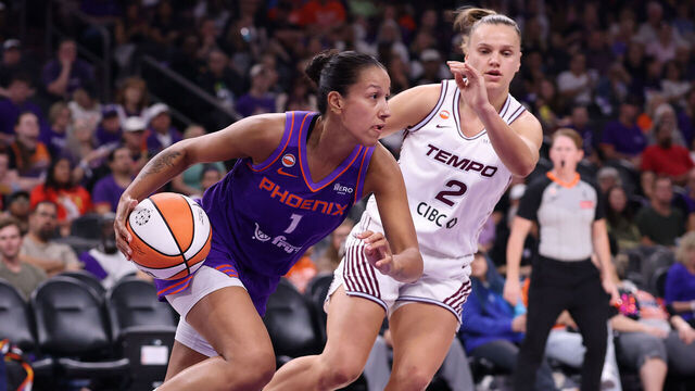 PHOENIX, ARIZONA - AUGUST 29: Noemie Brochant #1 of the Phoenix Mercury dribbles the ball against Laura Juskaite #2 of the Toronto Tempo during the first half at Mortgage Matchup Center on August 29, 2026 in Phoenix, Arizona.