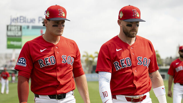 FORT MYERS, FLORIDA - FEBRUARY 22: Roman Anthony #19 of the Boston Red Sox and Trevor Story #10 of the Boston Red Sox warm up before a game against the Toronto Blue Jays at JetBlue Park at Fenway South on February 22, 2026 in Fort Myers, Florida.