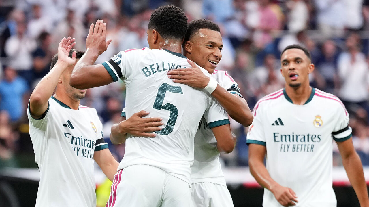 MADRID, SPAIN - AUGUST 30: Jude Bellingham and Kylian Mbappe of Real Madrid celebrate after Alfonso Herrero of Malaga scores an own goal, the second goal for Real Madrid during the LaLiga EA Sports 2026/27 match between Real Madrid and Malaga CF at Estadio Santiago Bernabeu on August 30, 2026 in Madrid, Spain.
