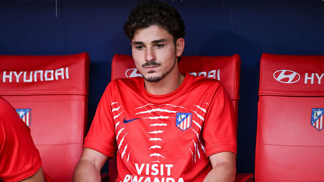 Julian Alvarez (No. 19) of Atletico Madrid warms up on the sideline during the LaLiga regular season Round 2 match against Villarreal at Civitas Metropolitano in Madrid, Spain, on August 23, 2026.