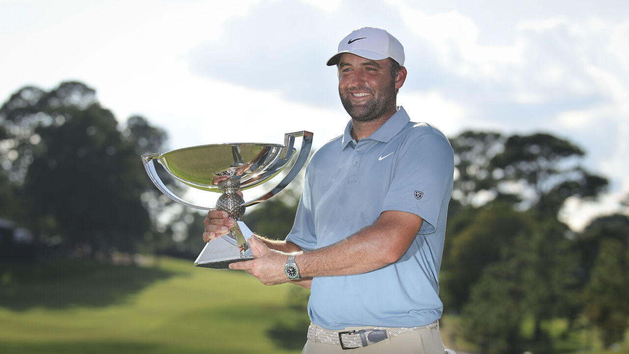ATLANTA, GEORGIA - AUGUST 30: Scottie Scheffler of the United States poses with the trophy after winning the final round of the TOUR Championship 2026 at East Lake Golf Club on August 30, 2026 in Atlanta, Georgia.