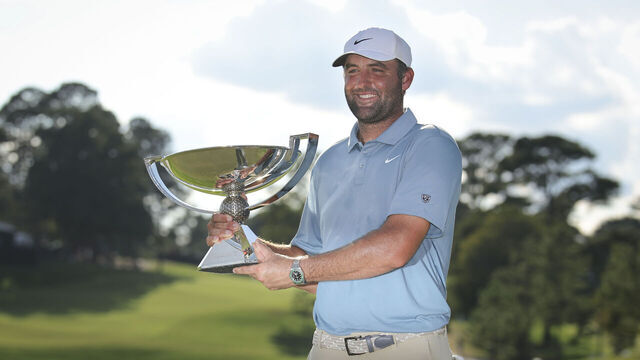 ATLANTA, GEORGIA - AUGUST 30: Scottie Scheffler of the United States poses with the trophy after winning the final round of the TOUR Championship 2026 at East Lake Golf Club on August 30, 2026 in Atlanta, Georgia.