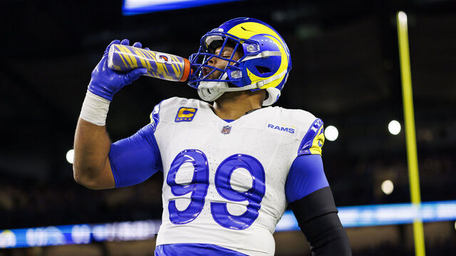 DETROIT, MICHIGAN - JANUARY 14: Aaron Donald #99 of the Los Angeles Rams drinks from a Gatorade water bottle during pregame warmups prior to an NFC Wild Card Playoff football game against the Detroit Lions at Ford Field on January 14, 2024 in Detroit, Michigan.