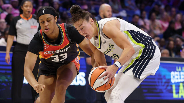 ARLINGTON, TEXAS - AUGUST 30: Jessica Shepard #32 of the Dallas Wings steals the ball from Nell Angloma #33 of the Connecticut Sun during the first half at College Park Center on August 30, 2026 in Arlington, Texas. NOTE TO USER: User expressly acknowledges and agrees that, by downloading and or using this photograph, User is consenting to the terms and conditions of the GettyImages License Agreement.