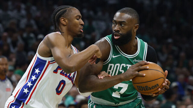 Boston, MA - May 2: Boston Celtics guard Jaylen Brown dribbles against Philadelphia 76ers guard Tyrese Maxey in the first quarter. The Boston Celtics and Philadelphia 76ers played in the first round of the NBA Playoffs at TD Garden on May 2, 2026.