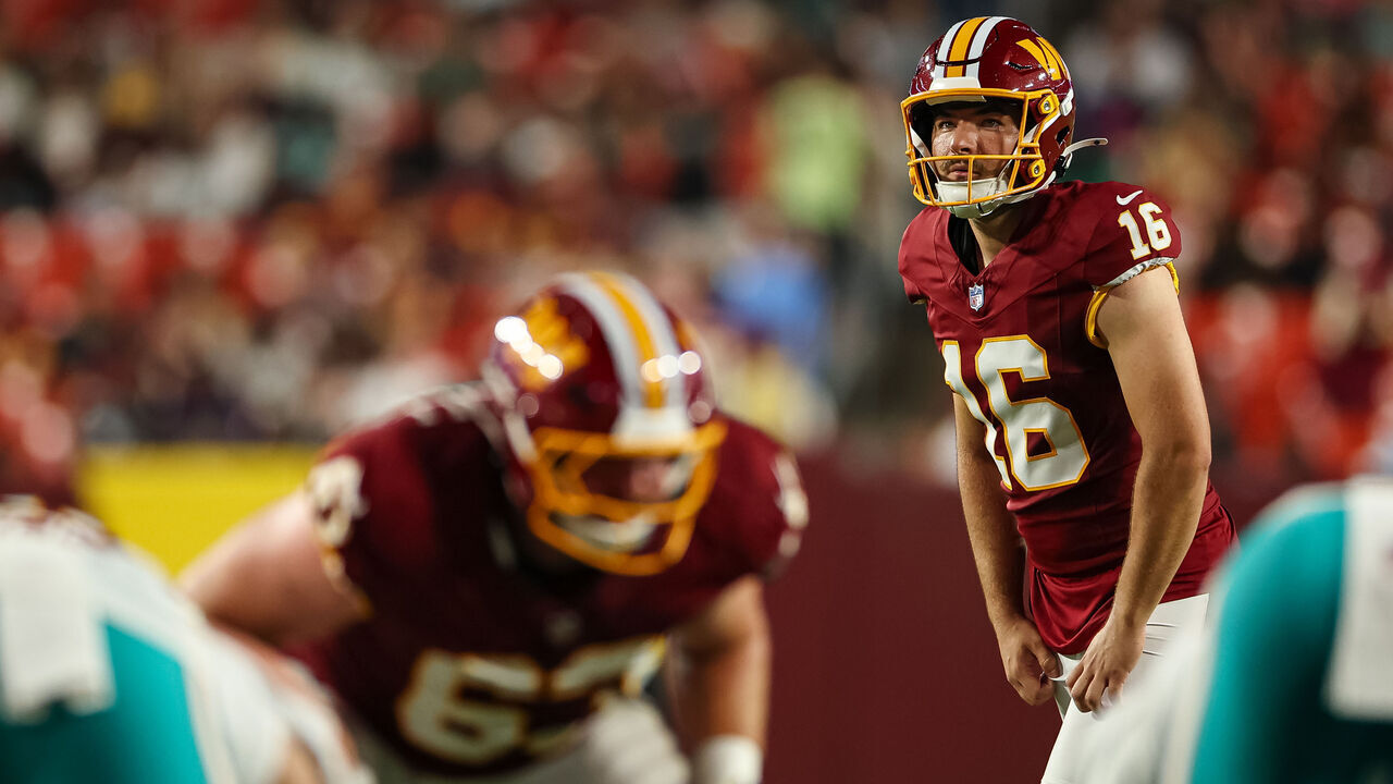 LANDOVER, MD - AUGUST 14: Jake Moody #16 of the Washington Commanders looks to kick an extra point against the Miami Dolphins during the first half of a preseason game at Northwest Stadium on August 14, 2026 in Landover, Maryland.