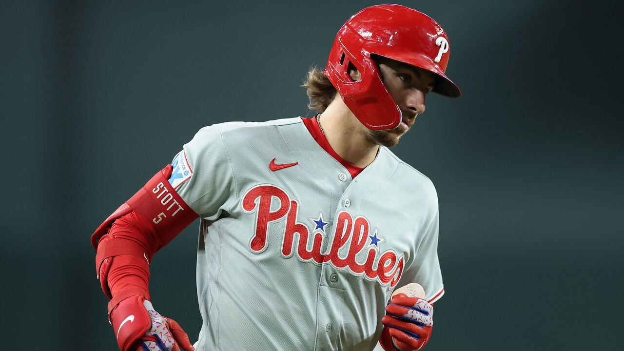PHOENIX, ARIZONA - AUGUST 31: Bryson Stott #5 of the Philadelphia Phillies rounds the bases after hitting a solo home run against the Arizona Diamondbacks during the first inning of the MLB game at Chase Field on August 31, 2026 in Phoenix, Arizona.