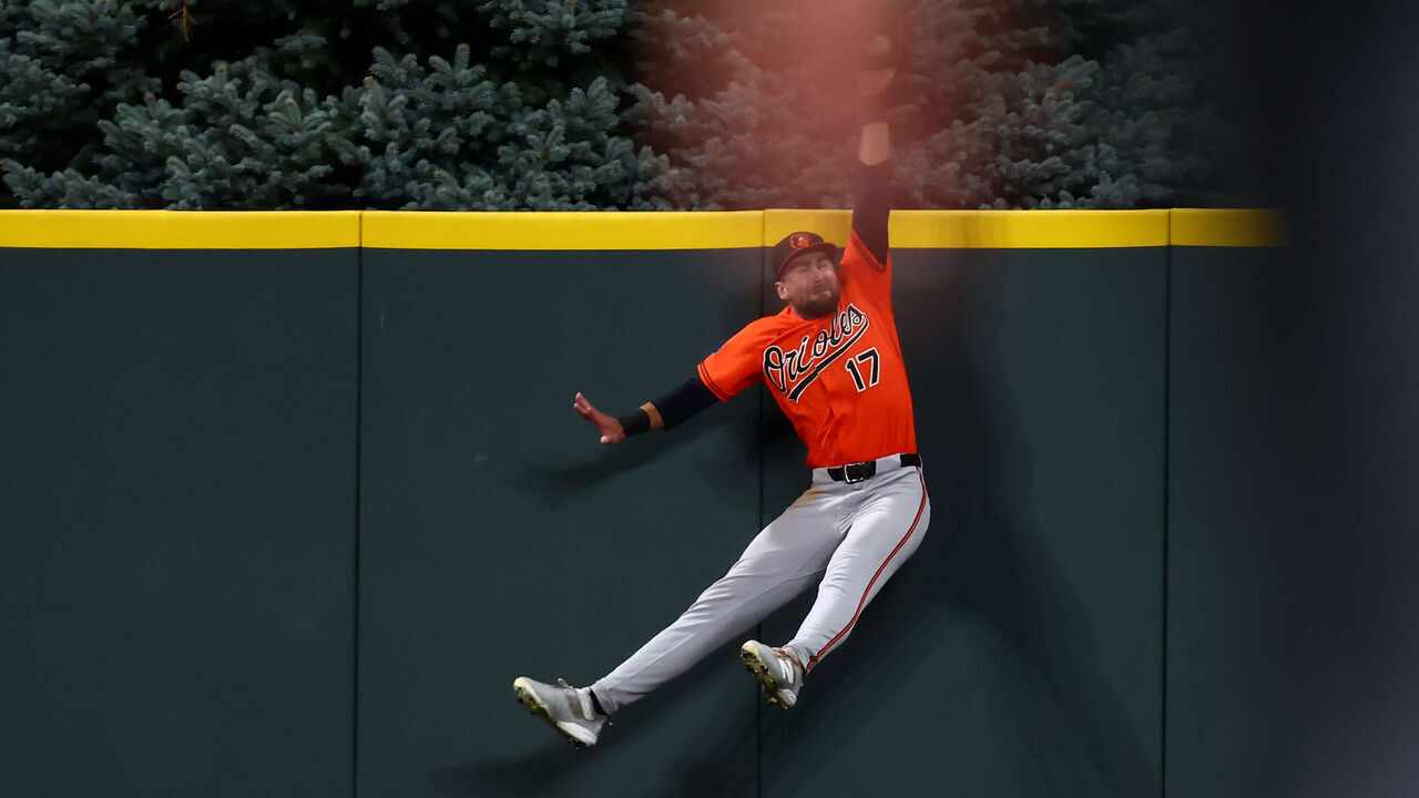DENVER, CO - AUGUST 31: Colton Cowser #17 of the Baltimore Orioles celebrates robs Jake McCarthy of the Colorado Rockies of a home run in the ninth inning that would have won the game at Coors Field on August 31, 2026 in Denver, Colorado. Baltimore Orioles won the game 2-1.