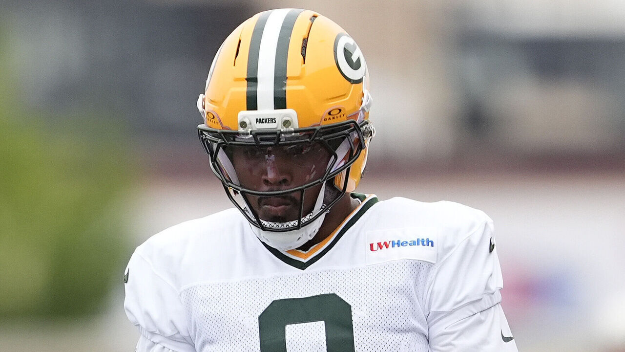ASHWAUBENON, WISCONSIN - JULY 31: Josh Jacobs #8 of the Green Bay Packers holds a Gatorade bottle during the Green Bay Packers training camp at Ray Nitschke Field on July 31, 2026 in Ashwaubenon, Wisconsin.
