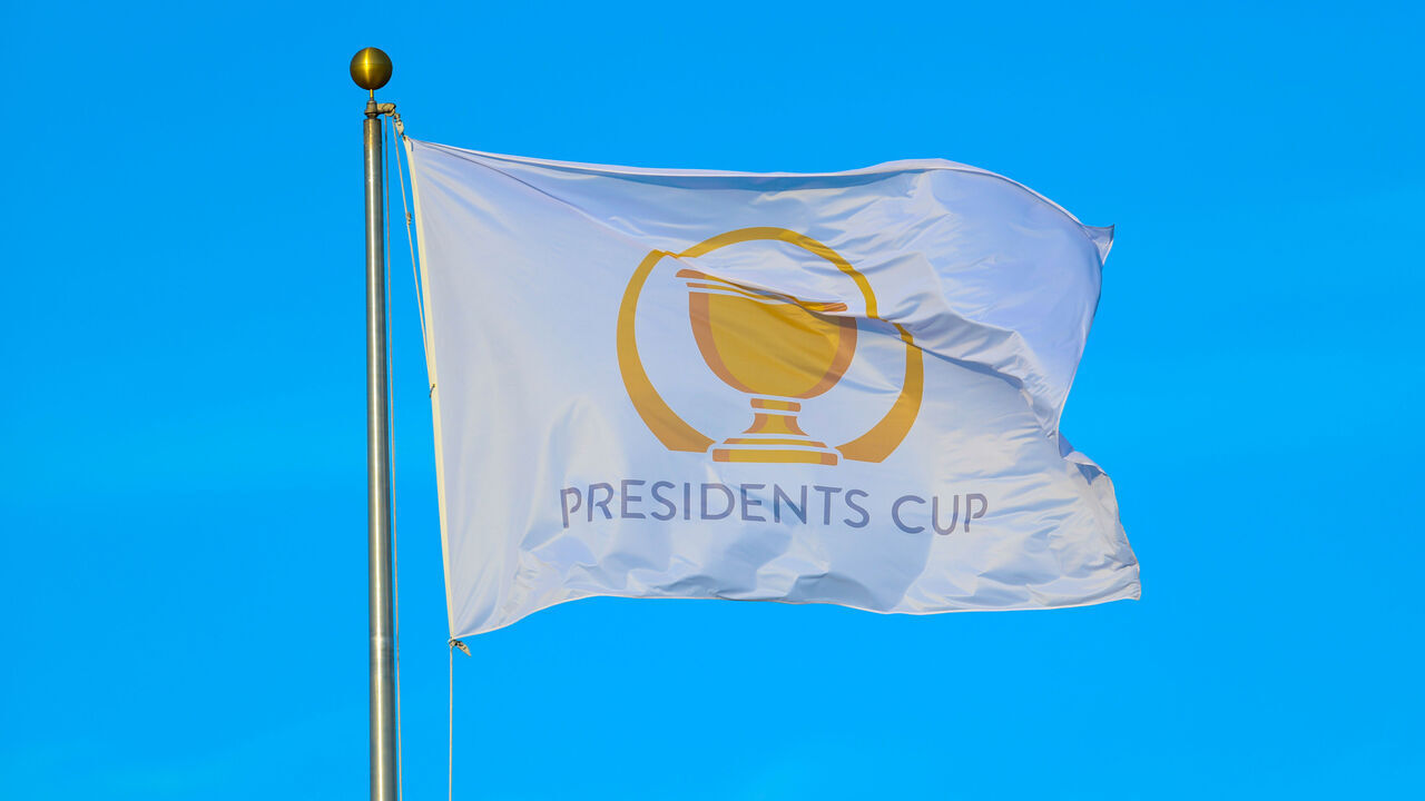 CHARLOTTE, NC - SEPTEMBER 22: The Presidents Cup flag flies in the air during the first round of the Presidents Cup on Sep 22, 2022, at Quail Hollow Club in Charlotte, NC.
