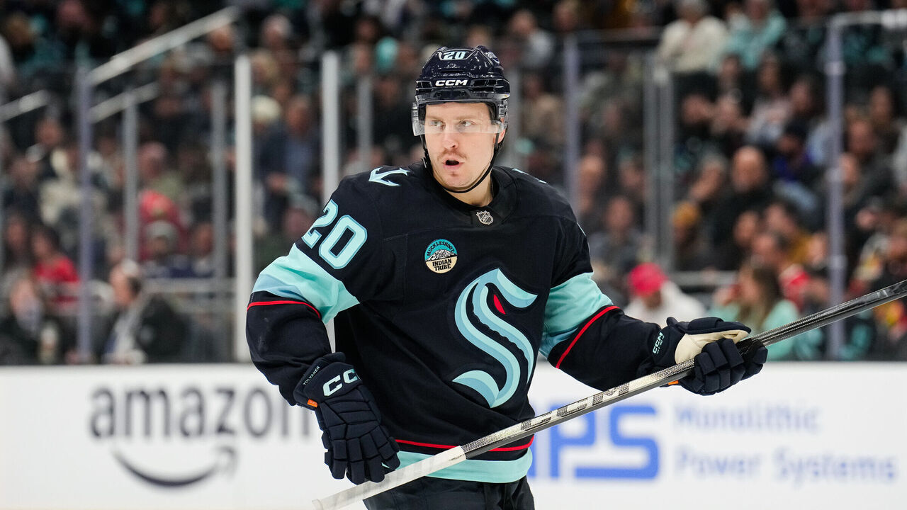 SEATTLE, WASHINGTON - APRIL 04: Eeli Tolvanen #20 of the Seattle Kraken looks on against the Chicago Blackhawks during the first period at Climate Pledge Arena on April 04, 2026 in Seattle, Washington.