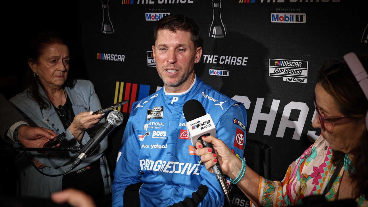 CHARLOTTE, NORTH CAROLINA - SEPTEMBER 02: Denny Hamlin, driver of the #11 Joe Gibbs Racing Toyota speaks to the media during the NASCAR Cup Series Chase Media Day at Charlotte Convention Center on September 02, 2026 in Charlotte, North Carolina.