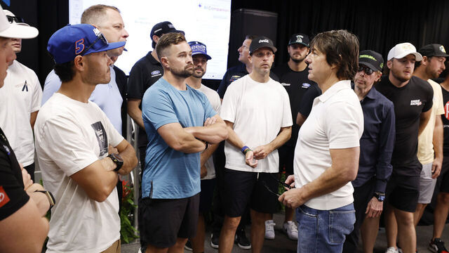 DAYTONA BEACH, FLORIDA - AUGUST 29: Tom Cruise speaks to guests at the NASCAR COKE ZERO SUGAR 400 at Daytona International Speedway on August 29, 2026, in preperation for Days of Thunder.