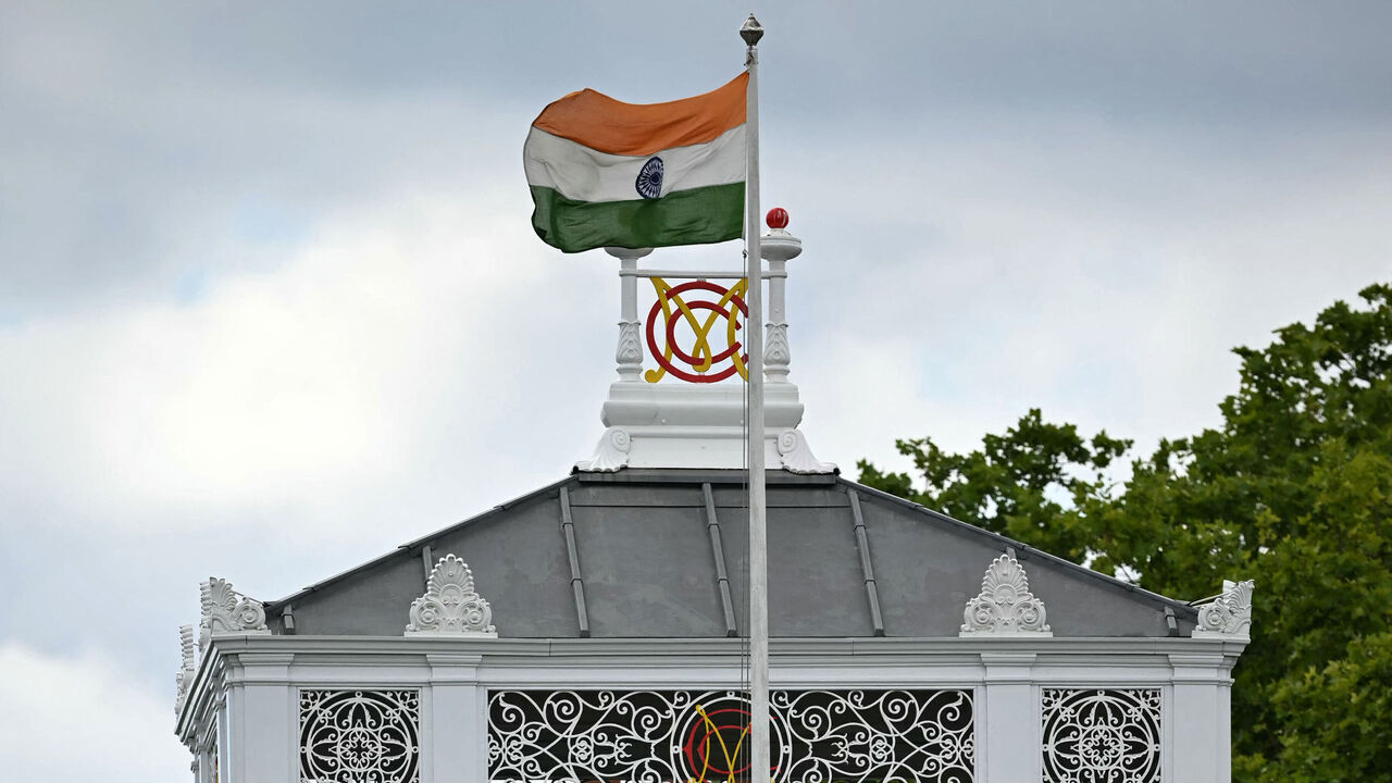 India's flag flies on the pavilion beside the MCC (Marylebone Cricket Club) logo, during the ICC Women's T20 cricket world cup 2026 game between Australia and India, at Lord's in London on June 28, 2026.