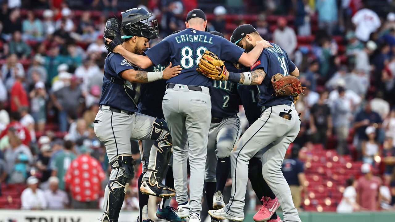 BOSTON, MA - SEPTEMBER 2: (L-R) Catcher Jhonny Pereda #5, Cooper Criswell #88 and Weston Wilson #31 of the Seattle Mariners join teammates in a dance after an 8-3 win over the Boston Red Sox at Fenway Park on September 2, 2026 in Boston, Massachusetts.