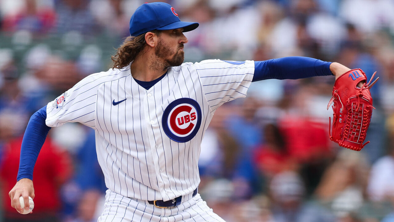 CHICAGO, ILLINOIS - AUGUST 29: Kevin Gausman #12 of the Chicago Cubs delivers a pitch against the Cincinnati Reds during the first inning at Wrigley Field on August 29, 2026 in Chicago, Illinois.