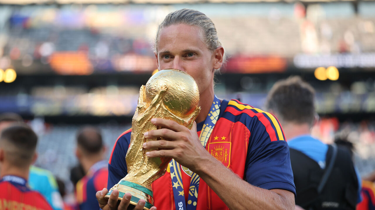 EAST RUTHERFORD, NEW JERSEY - JULY 19: Marcos Llorente #5 of Spain kisses the FIFA World Cup Winner’s Trophy after the team’s victory following the FIFA World Cup 2026 Final match between Spain and Argentina at New York New Jersey Stadium on July 19, 2026 in East Rutherford, New Jersey.