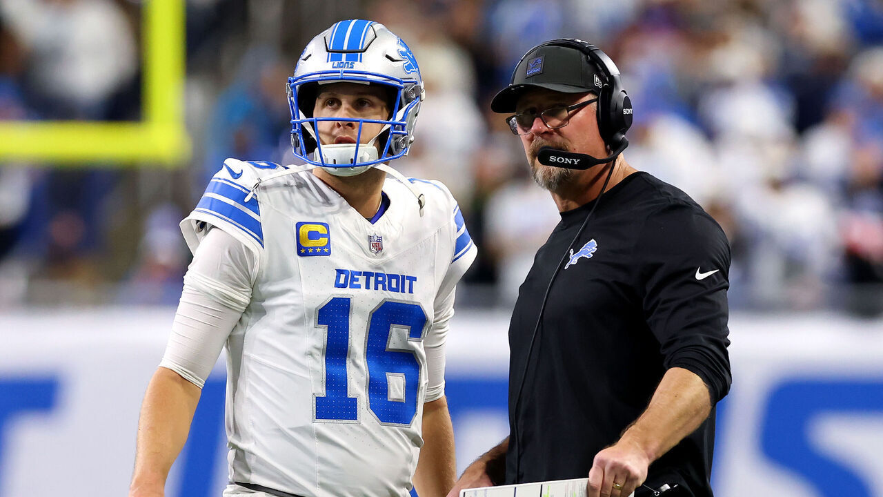 DETROIT, MICHIGAN - DECEMBER 04: (L-R) Jared Goff #16 looks on alongside head coach Dan Campbell of the Detroit Lions against the Dallas Cowboys during the fourth quarter at Ford Field on December 04, 2025 in Detroit, Michigan.