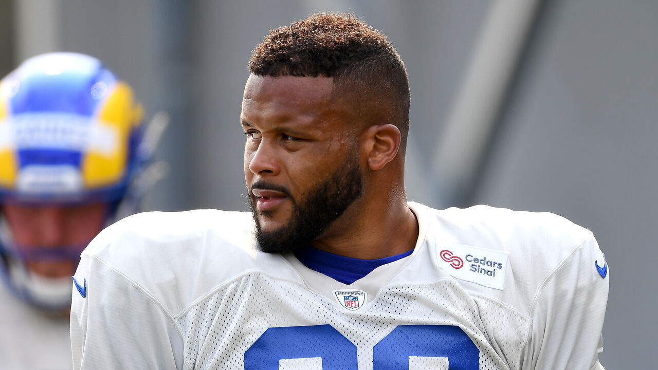 THOUSAND OAKS, CA - AUGUST 18: Defensive tackle Aaron Donald #99 of the Los Angeles Rams looks on during training camp on August 18, 2020 at the Rams training facility in Thousand Oaks, California.