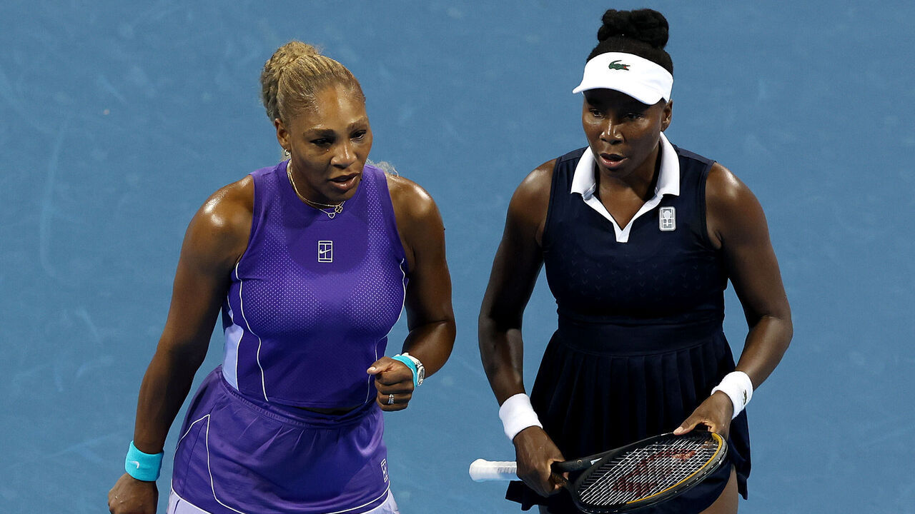 MASON, OHIO - AUGUST 17: Serena Williams and Venus Williams of the United States confer while playing Marta Kostyuk of Czechia and Peyton Stearns of the United States during day seven of the Cincinnati Open at the Lindner Family Tennis Center on August 17, 2026 in Mason, Ohio.