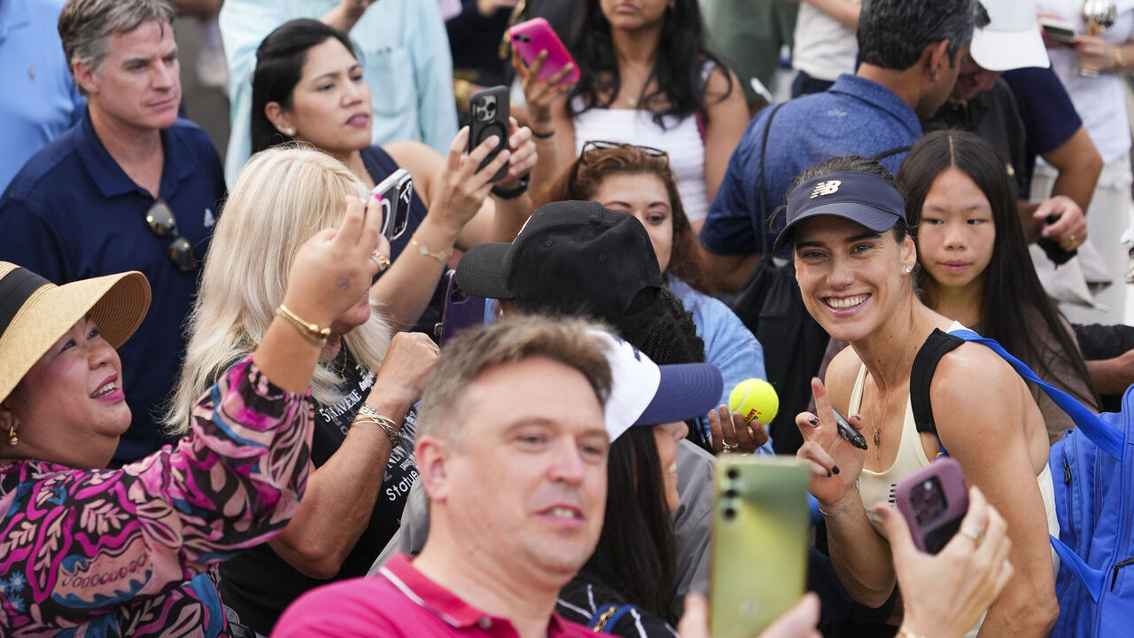 NEW YORK, NEW YORK - AUGUST 31: Sorana Cirstea poses for a selfie with a fan after a Women's Singles match on Day Two of the 2026 US Open at USTA Billie Jean King National Tennis Center on Monday, August 31, 2026 in Flushing, NY.