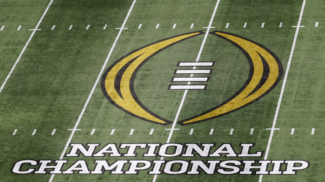 ATLANTA, GA - JANUARY 20: The College Football Playoff National Championship logo at midfield before the Ohio State Buckeyes versus Notre Dame Fighting Irish College Football Playoff National Championship game on January 20, 2025, at Mercedes-Benz Stadium in Atlanta, GA.