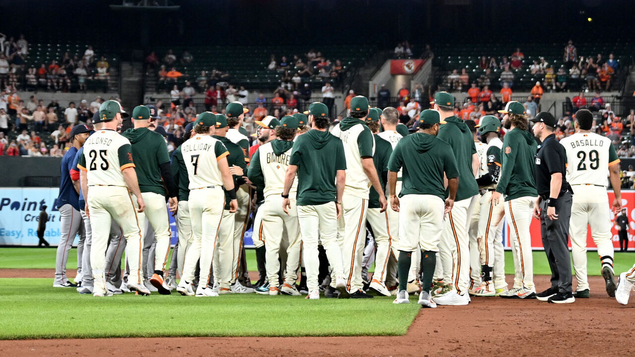 BALTIMORE, MARYLAND - SEPTEMBER 04: The Baltimore Orioles and Boston Red Sox players run onto the field after an altercation during the eighth inning at Oriole Park at Camden Yards on September 04, 2026 in Baltimore, Maryland.