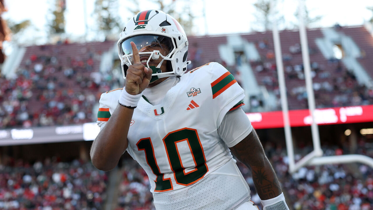 STANFORD, CALIFORNIA - SEPTEMBER 04: Darian Mensah #10 of the Miami (FL) Hurricanes reacts after Miami scored their second touchdown against the Stanford Cardinal in the first half at Stanford Stadium on September 04, 2026 in Stanford, California.